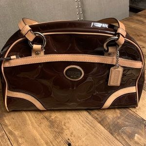 Coach patent leather bag with leather straps